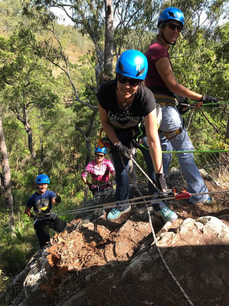 uni student activities camp abseiling group